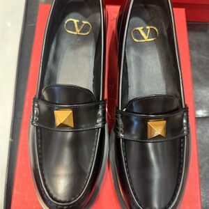Valentino Garavani Black Leather Loafers with Gold Pyramid Studs